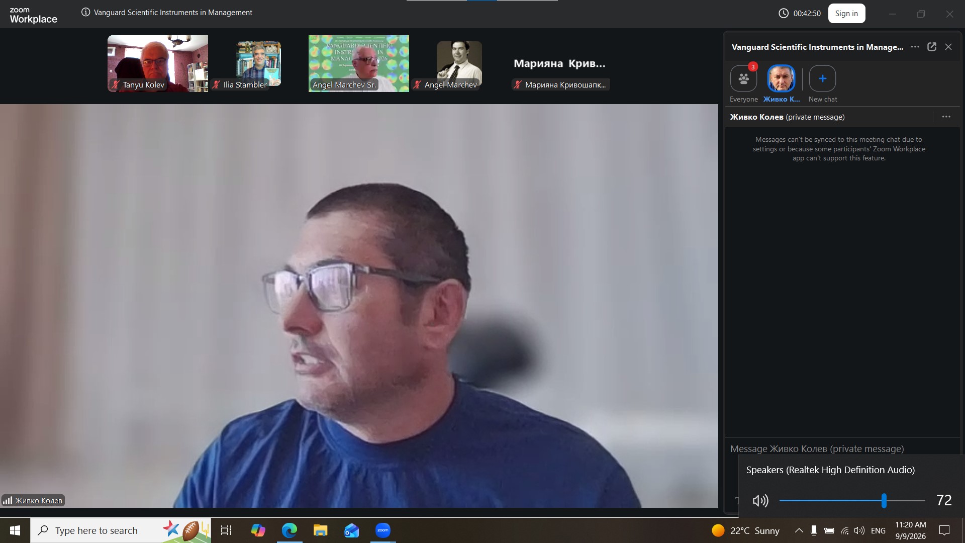 Jivko Kolev speaking online at VSIM 2026, with fellow conference participants visible above him.
